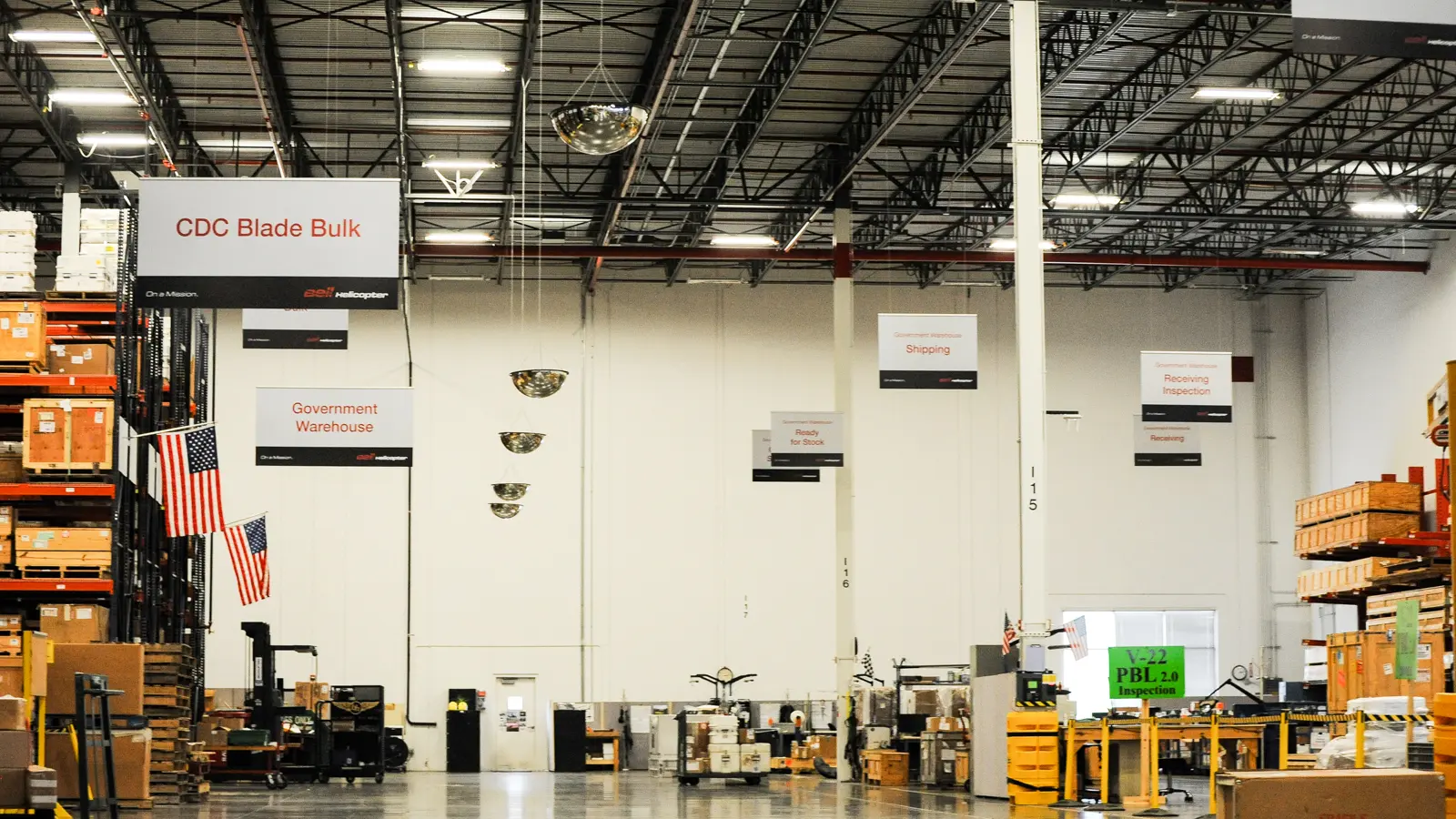 Spacious warehouse interior with shelving and crates